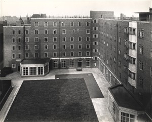 Photo:Inner court showing dining room in north wing and nurses' sitting room in east wing (bottom right) of new nurses' home, Oct 1937 (Catalogue reference: SC01601-B5933)